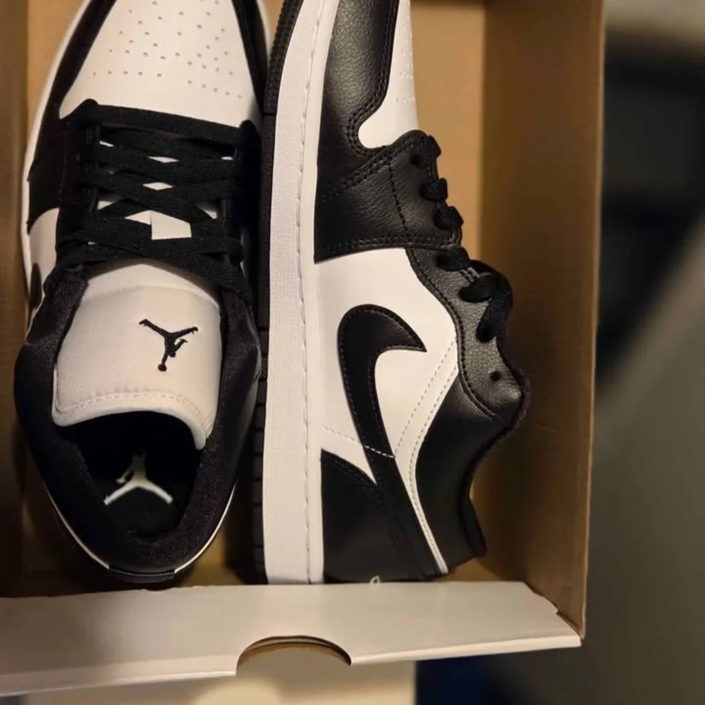 Jordan Women's Low Top Sneakers in Black and White - Picture 2 of 8